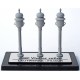 3 WHITE METAL SIGNAL BELLS ON A PRESENTATION SUPPORT
